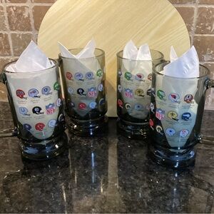 Vintage NFL smoky gray mugs with mini helmets